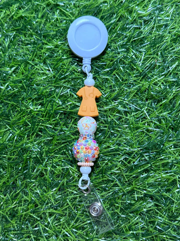 Orange Scrub Top Badge Reel